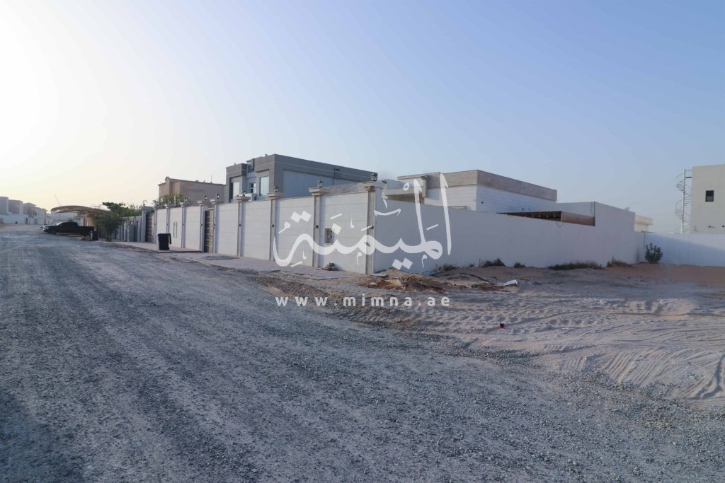 Empty land with residential buildings nearby al awair dubai